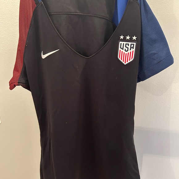 Nike Black Soccer Jersey with Red and Blue Accents - Picture 1 of 5
